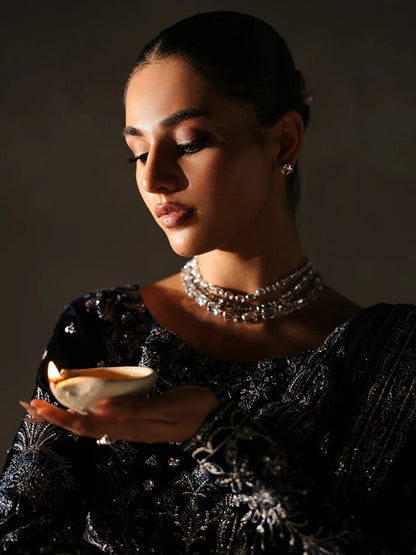 Stunning velvet embroidered 3PC lehenga set with sequined bodice, raw silk panels & chiffon dupatta. Perfect for weddings, parties & festive occasions.