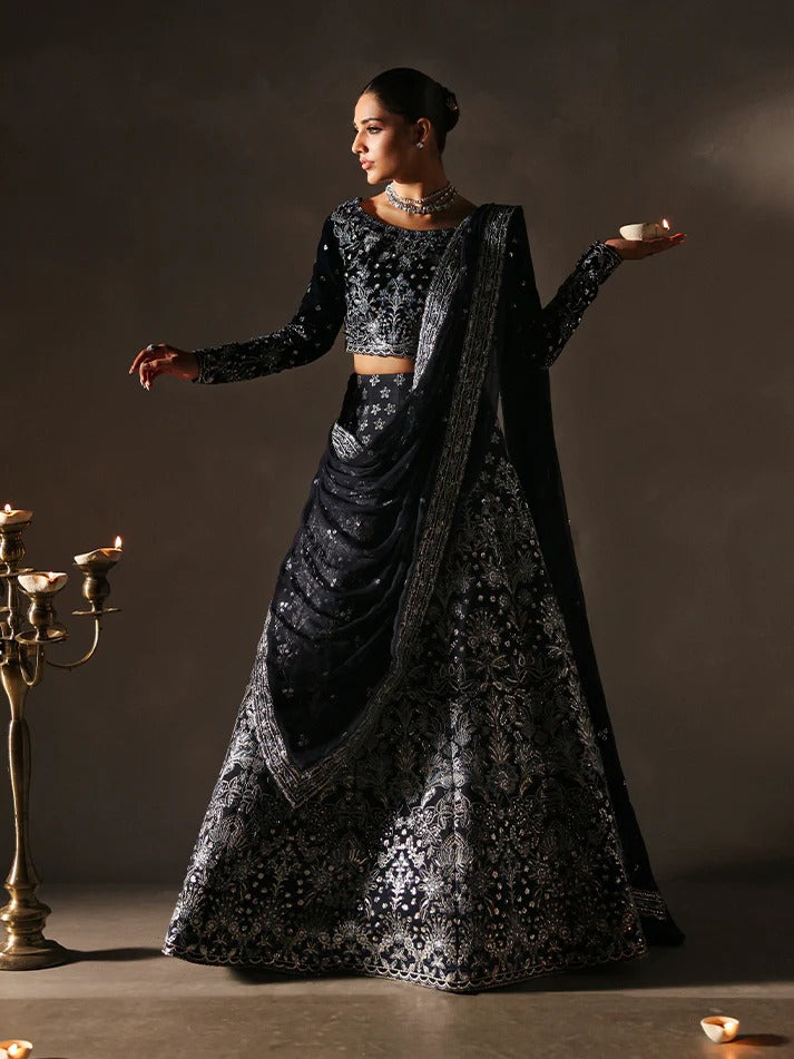 Stunning velvet embroidered 3PC lehenga set with sequined bodice, raw silk panels & chiffon dupatta. Perfect for weddings, parties & festive occasions.