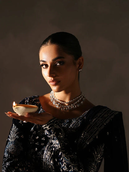 Stunning velvet embroidered 3PC lehenga set with sequined bodice, raw silk panels & chiffon dupatta. Perfect for weddings, parties & festive occasions.