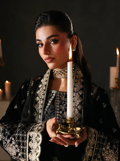 Luxurious velvet embroidered 3PC suit with sequins, chiffon dupatta & raw silk trouser. Perfect for festive events, weddings & all-season premium style.