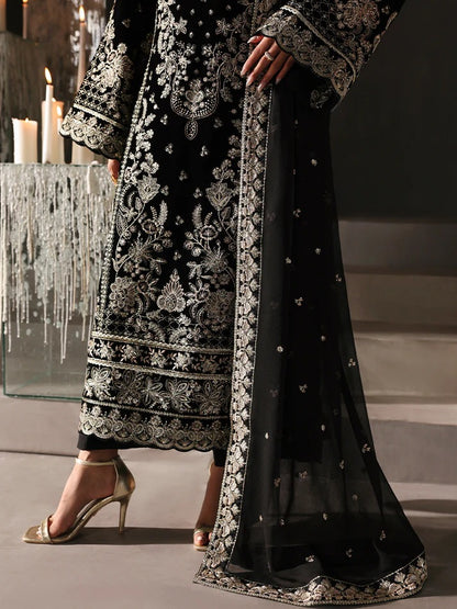 Luxurious velvet embroidered 3PC suit with sequins, chiffon dupatta & raw silk trouser. Perfect for festive events, weddings & all-season premium style.
