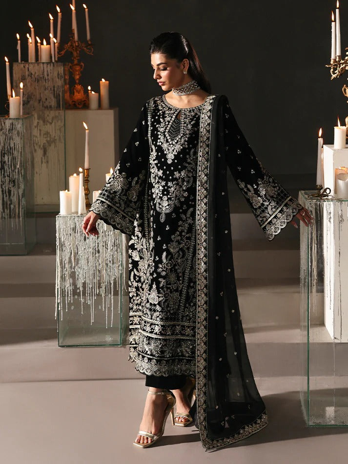 Luxurious velvet embroidered 3PC suit with sequins, chiffon dupatta & raw silk trouser. Perfect for festive events, weddings & all-season premium style.