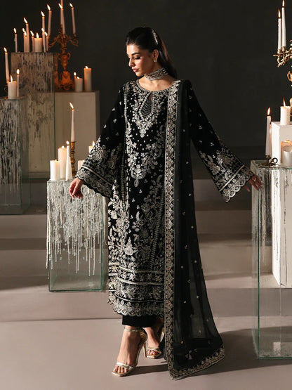 Luxurious velvet embroidered 3PC suit with sequins, chiffon dupatta & raw silk trouser. Perfect for festive events, weddings & all-season premium style.