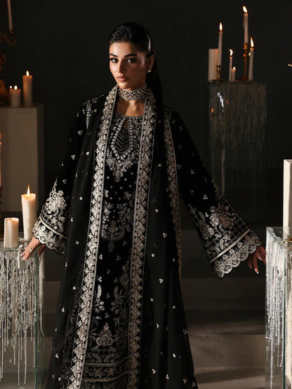 Luxurious velvet embroidered 3PC suit with sequins, chiffon dupatta & raw silk trouser. Perfect for festive events, weddings & all-season premium style.