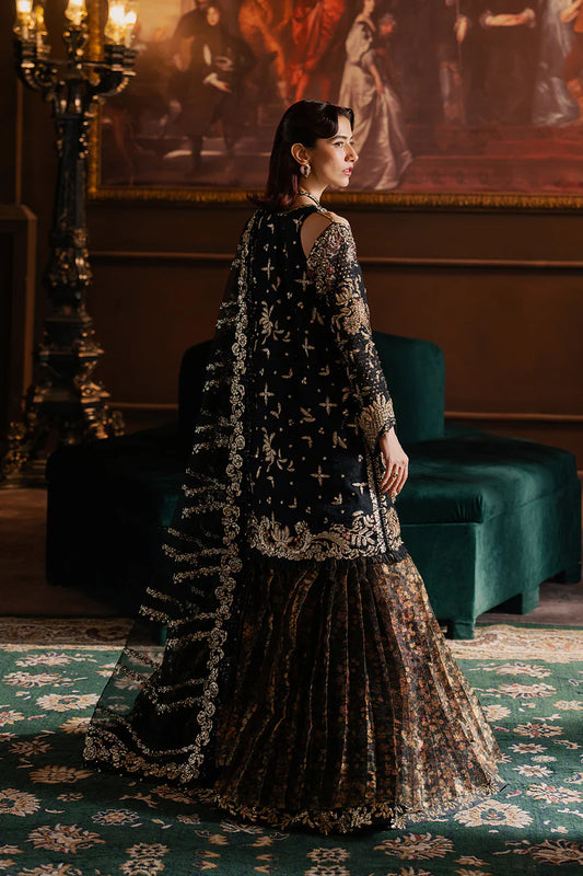 Elegant black wedding formal crafted in raw silk and organza with hand-embellished embroidery, statement borders and a luxurious dupatta.