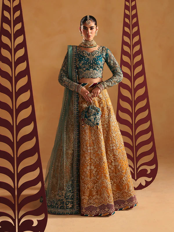 Luxury lehenga set featuring embroidered net bodice, sequined sleeves, organza panels, raw silk borders, detailed adda work, and matching embellished dupatta.