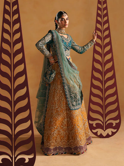 Luxury lehenga set featuring embroidered net bodice, sequined sleeves, organza panels, raw silk borders, detailed adda work, and matching embellished dupatta.