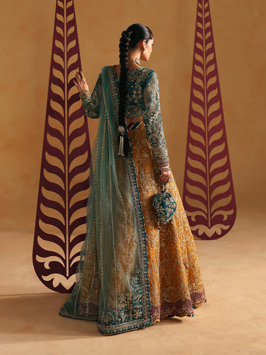Luxury lehenga set featuring embroidered net bodice, sequined sleeves, organza panels, raw silk borders, detailed adda work, and matching embellished dupatta.