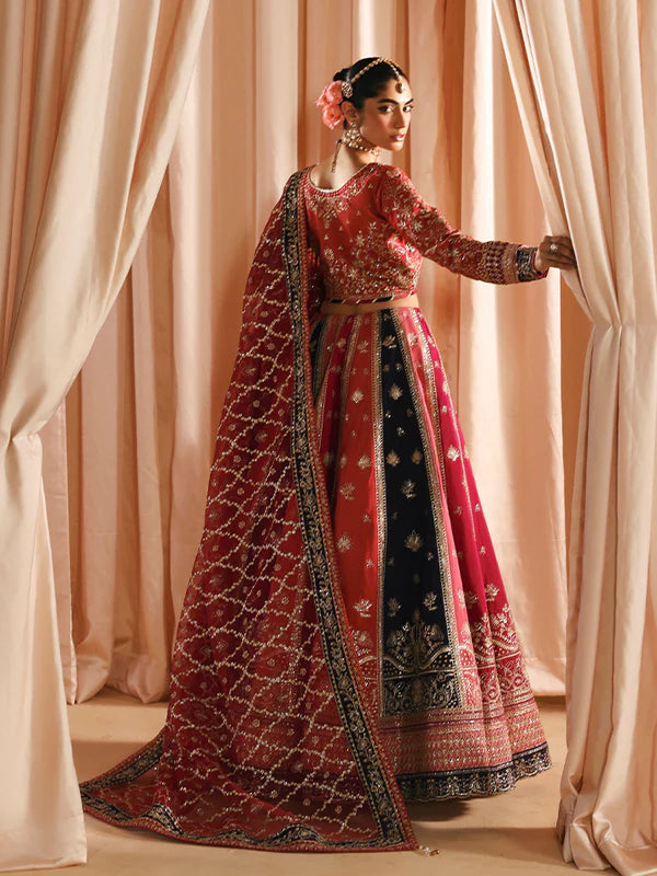 Luxury silk lehenga set with adda-worked bodice, sequined panels, detailed borders, embroidered sleeves, and a fully embellished organza dupatta ensemble.