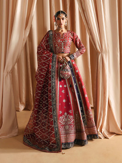 Luxury silk lehenga set with adda-worked bodice, sequined panels, detailed borders, embroidered sleeves, and a fully embellished organza dupatta ensemble.