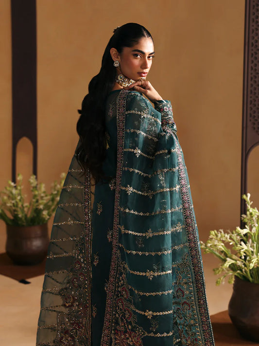 Elegant organza shirt set featuring sequined panels, embroidered borders and sleeves, linear dupatta with motifs, and a rich raw silk sharara ensemble.