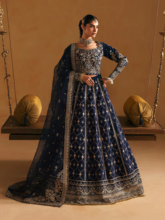 Luxury silk lehenga set with adda-worked bodice, sequined panels, detailed borders, embroidered sleeves, and an elegant organza dupatta ensemble for weddings.