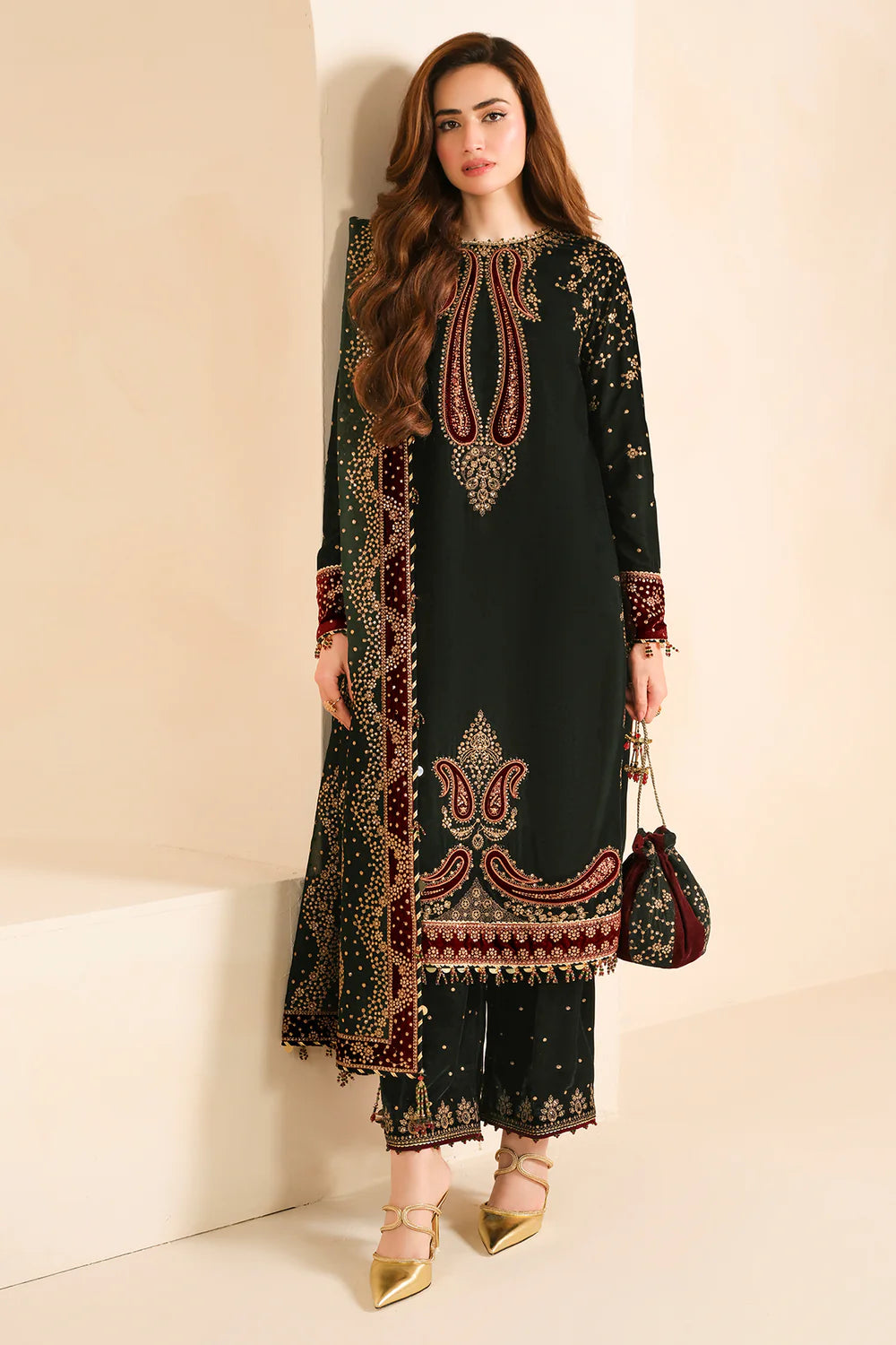 Elegant pure velvet formal dress with rich embroidery and chiffon dupatta. Unstitched luxury outfit designed to elevate your festive and formal style.