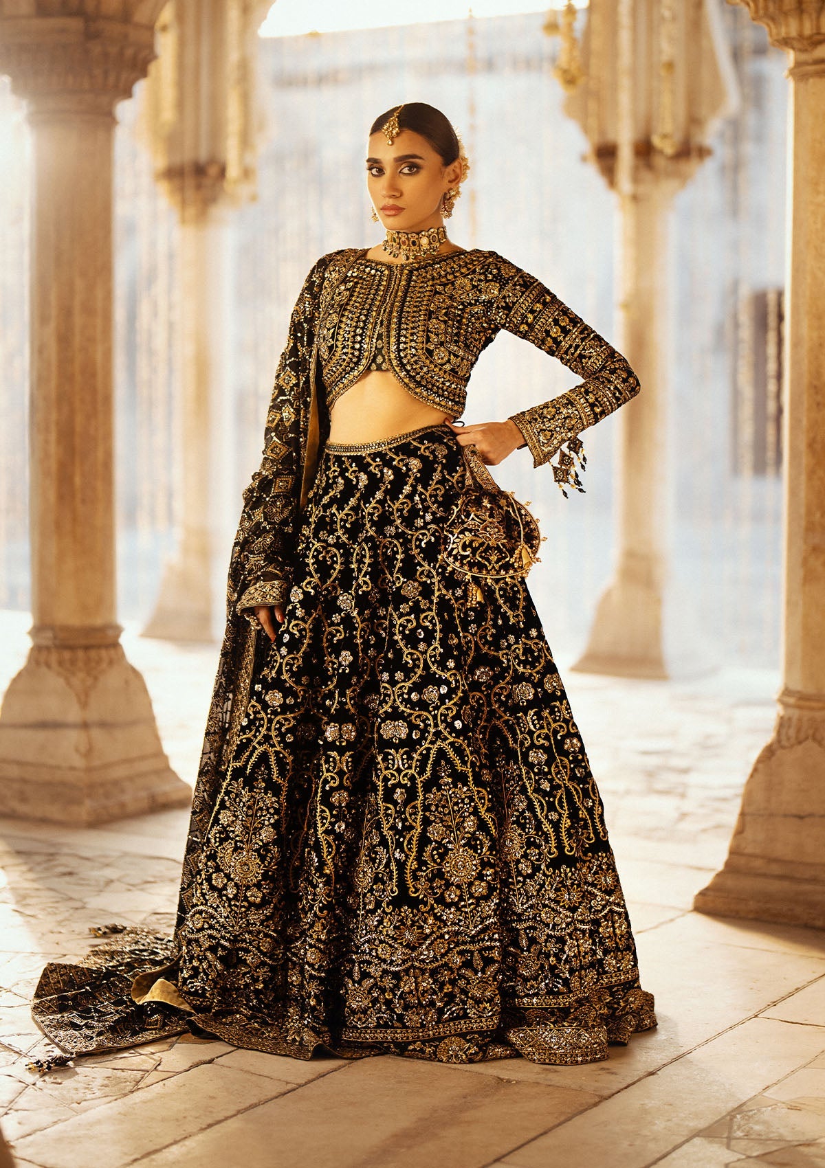 AIK Atelier Dastoor Look A2401 black velvet lehenga choli with gold embroidery