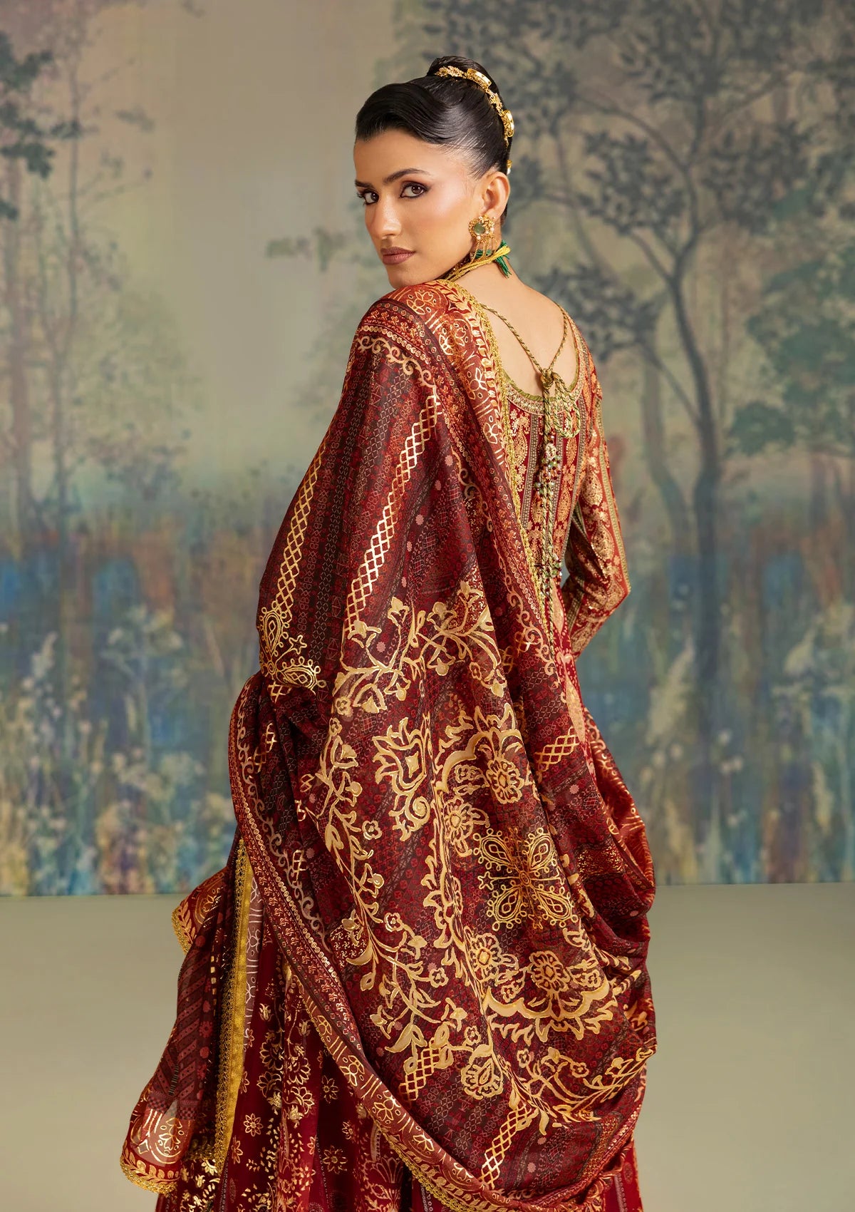 Elegant foil printed chiffon dress with embroidered organza neckline, borders and sleeves. Paired with medium silk pants and foil printed silk dupatta.