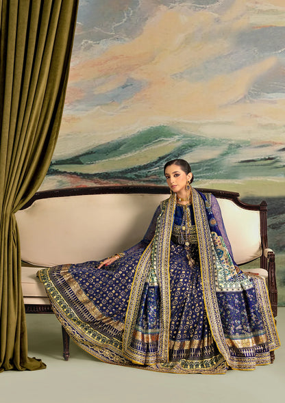 Elegant printed chiffon dress with embroidered silk bodice patches, organza borders and sleeves. Paired with medium silk pants and foil printed silk dupatta.