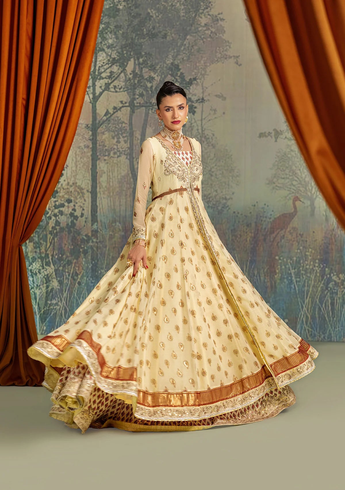 Stylish foil printed chiffon dress with embroidered organza neckline and borders. Paired with printed crepe silk pants and foil printed silk dupatta.