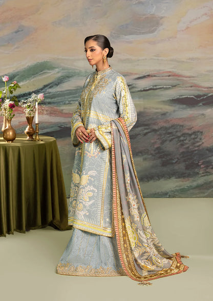 Elegant foil printed crepe silk dress with embroidered organza neckline patch and sleeves. Paired with printed crepe silk pants and foil printed silk dupatta.
