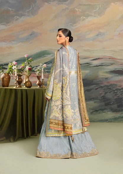Elegant foil printed crepe silk dress with embroidered organza neckline patch and sleeves. Paired with printed crepe silk pants and foil printed silk dupatta.