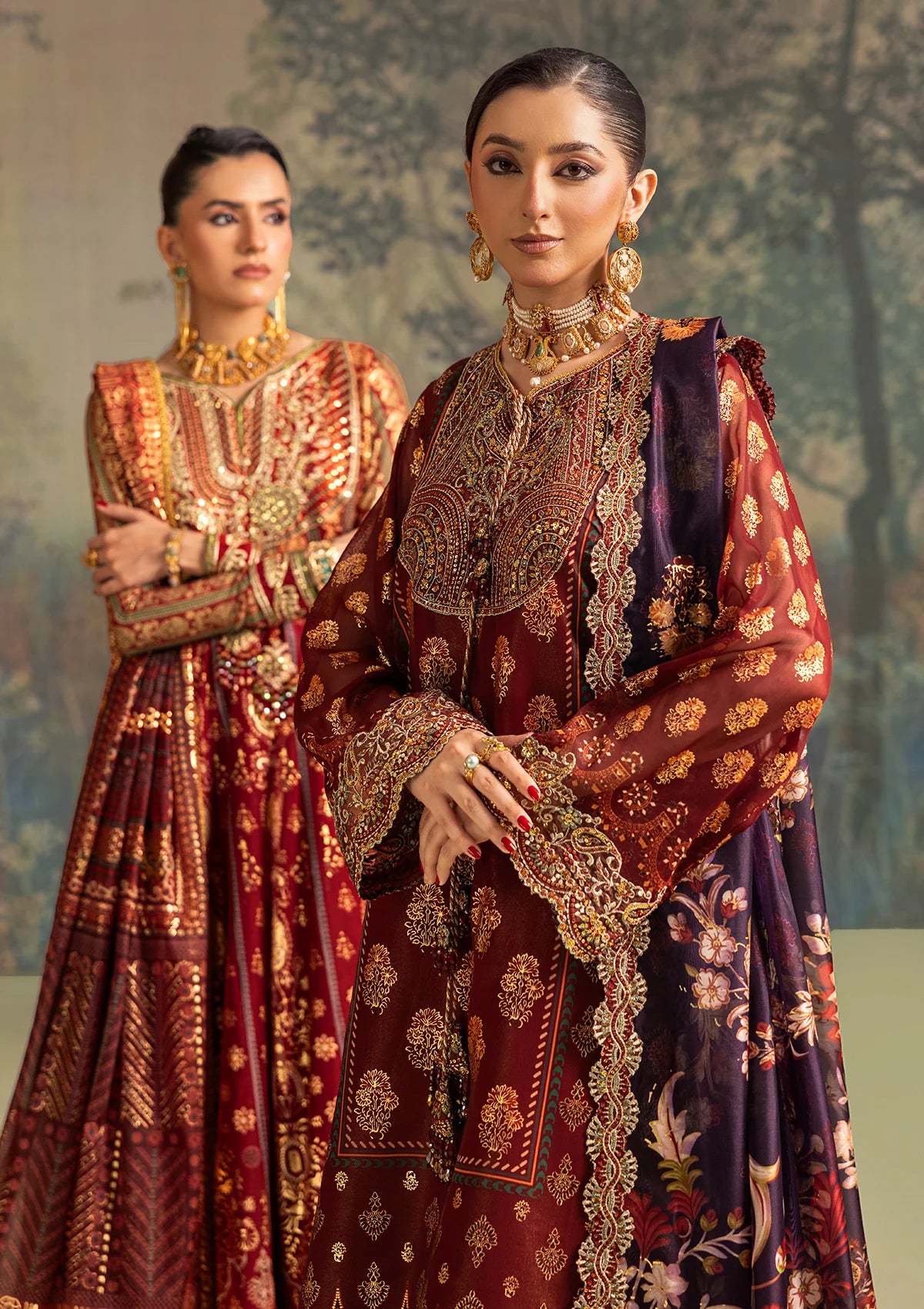 Elegant foil printed chiffon dress with embroidered organza neckline, borders and sleeves. Paired with masoori silk pants and foil printed silk dupatta.