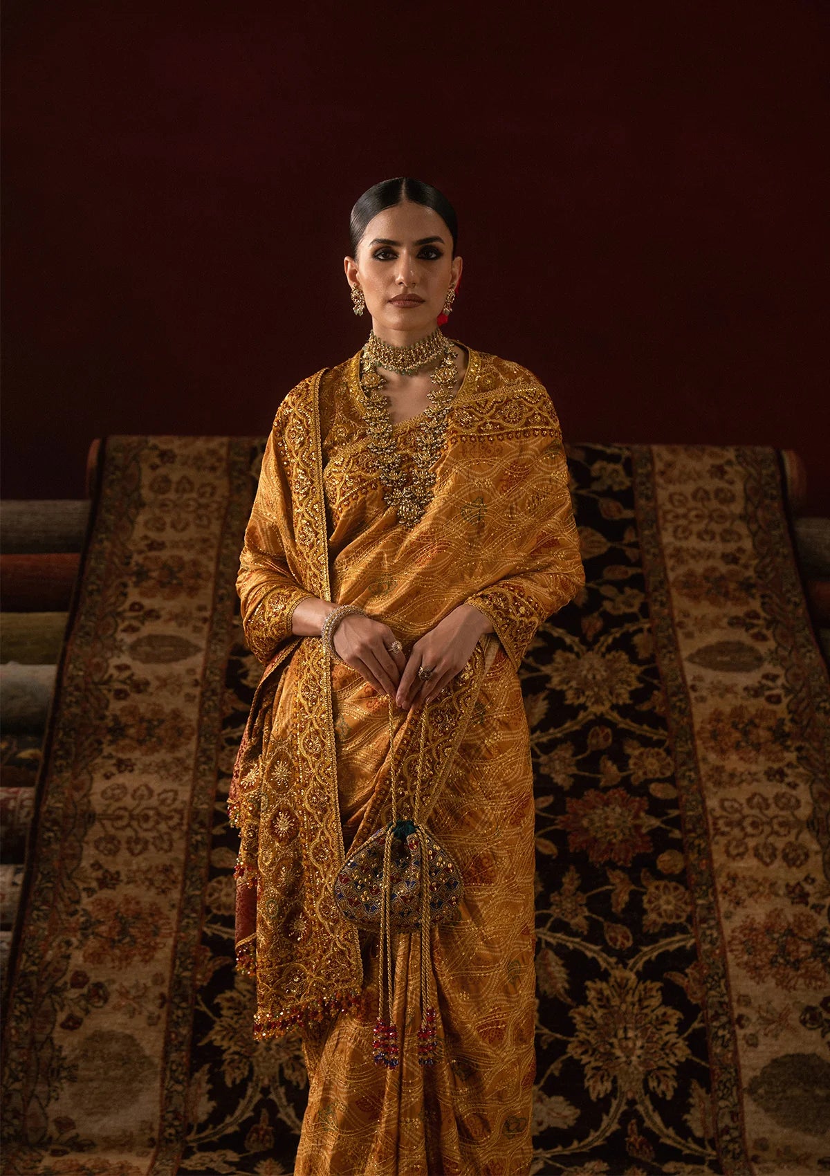 Elegant medium silk blouse with embroidered bodice and sleeves, paired with printed and embroidered tussar silk saree featuring pallu, borders, and medium silk petticoat.