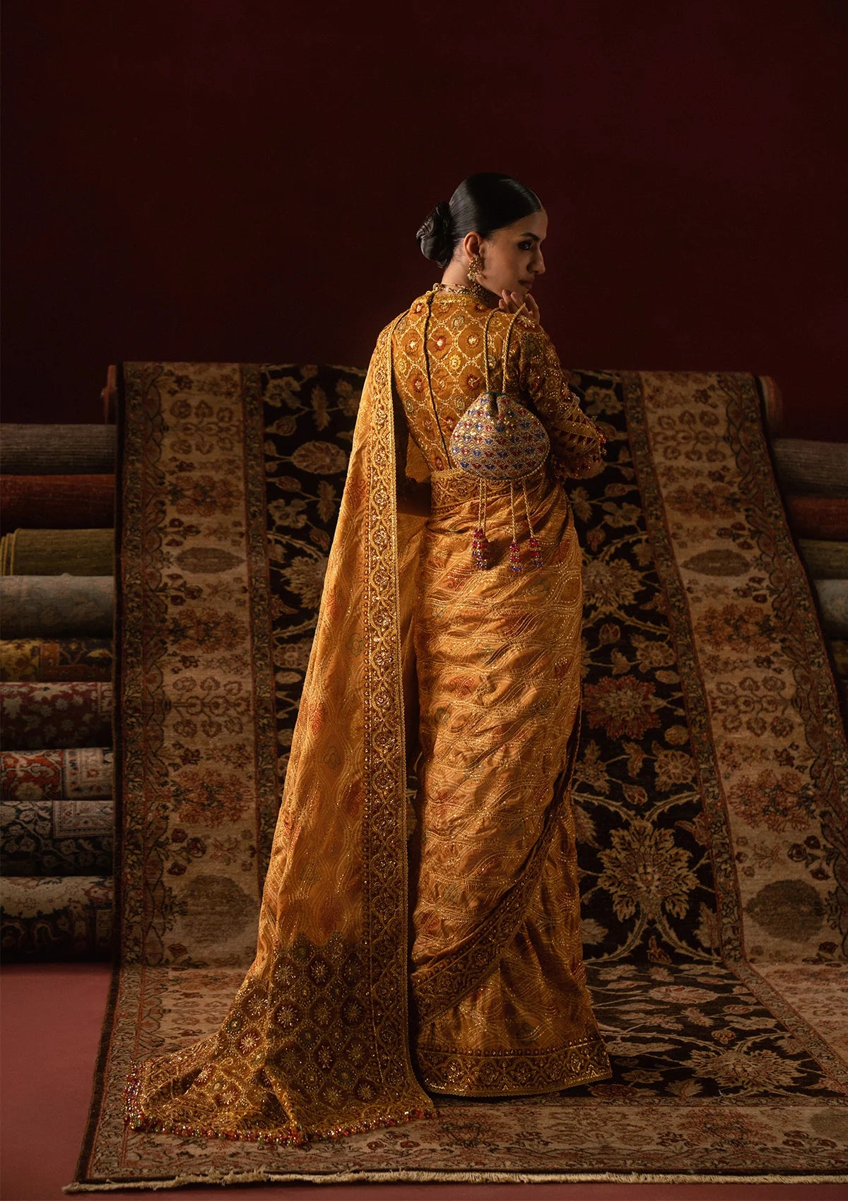 Elegant medium silk blouse with embroidered bodice and sleeves, paired with printed and embroidered tussar silk saree featuring pallu, borders, and medium silk petticoat.