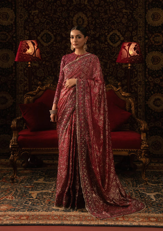 Elegant tussar silk saree with printed and embroidered fall and pallu, paired with medium silk blouse featuring embroidered sleeves, neckline, and petticoat for festive occasions.