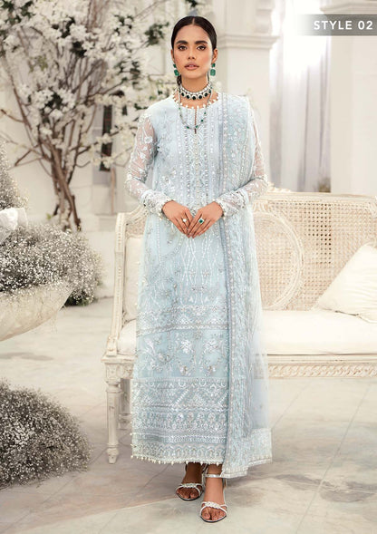 Elegant ice blue organza ensemble featuring hand embellishments, signature embroidery, silver sequins, pearl beadwork, raw silk pants, and an embroidered net dupatta for a refined pastel formal look.