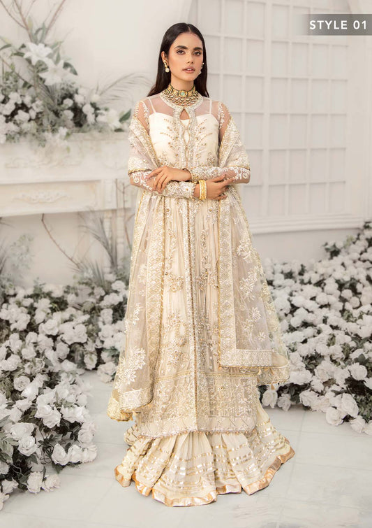 Elegant ivory net outfit with hand-embellished floral motifs, gold dipped pearls, sequins, glass beads, raw silk pants and an embroidered net dupatta luxe.