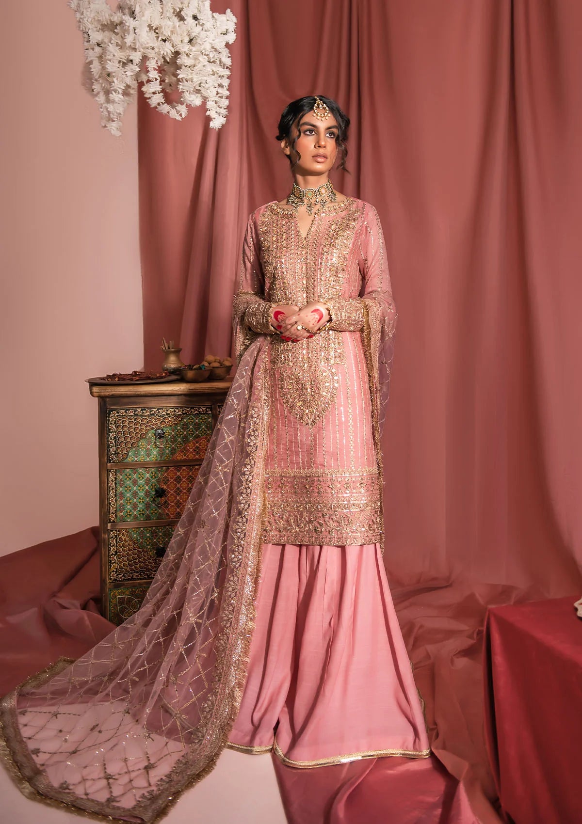 Chai pink khaddi net outfit inspired by Kashmiri marori embroidery, featuring tilla, sitara and gota details with raw silk pants and an embroidered net dupatta with organza borders