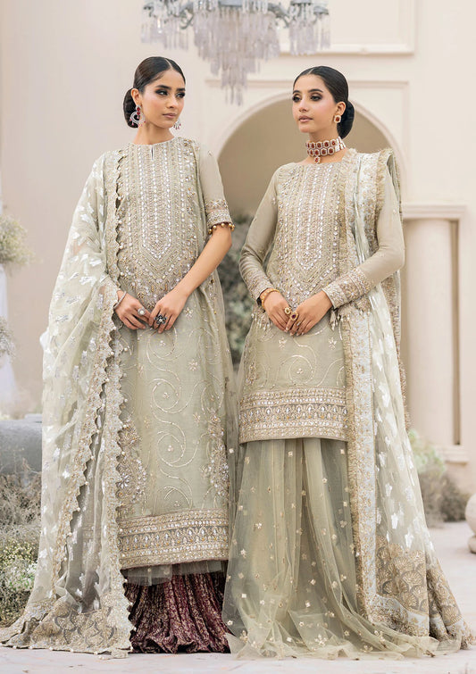 Elegant pearl grey khaadi net ensemble with Ganga-Jamuna neckline, heavy gota work, rococo-inspired motifs, masoori silk pants, and an organza jacquard dupatta.