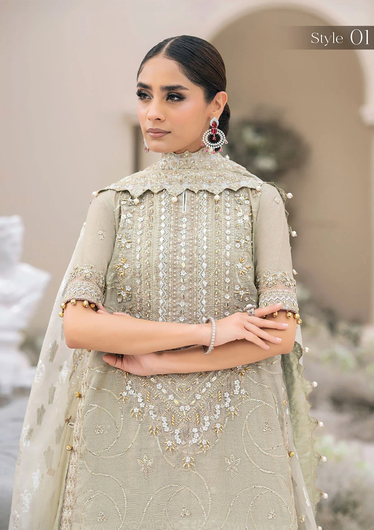 Elegant pearl grey khaadi net ensemble with Ganga-Jamuna neckline, heavy gota work, rococo-inspired motifs, masoori silk pants, and an organza jacquard dupatta.