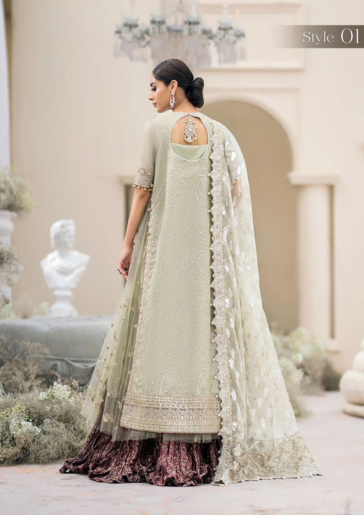 Elegant pearl grey khaadi net ensemble with Ganga-Jamuna neckline, heavy gota work, rococo-inspired motifs, masoori silk pants, and an organza jacquard dupatta.