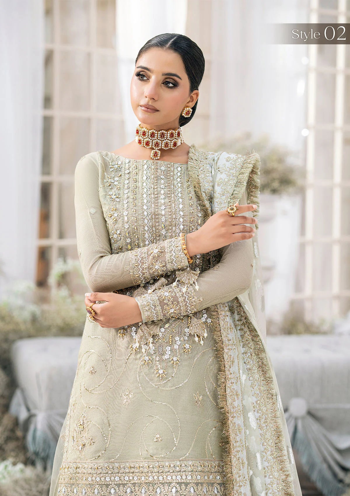 Elegant pearl grey khaadi net ensemble with Ganga-Jamuna neckline, heavy gota work, rococo-inspired motifs, masoori silk pants, and an organza jacquard dupatta.