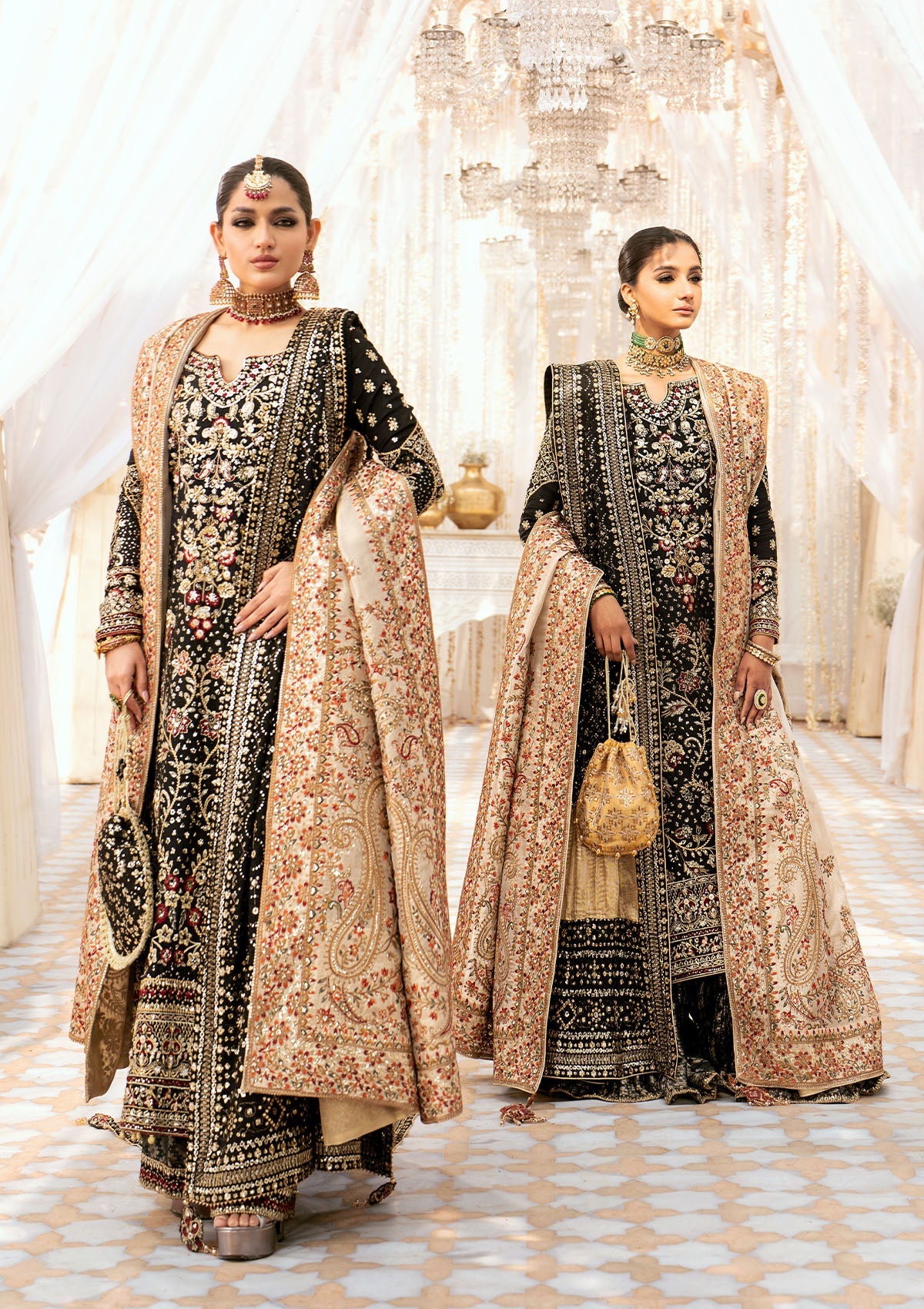 Luxurious medium silk ensemble with intricate embroidery, embellished borders, jamawaar pants, and an embroidered silk dupatta. Styled as a long shirt with gharara or izhaar pants for timeless elegance.