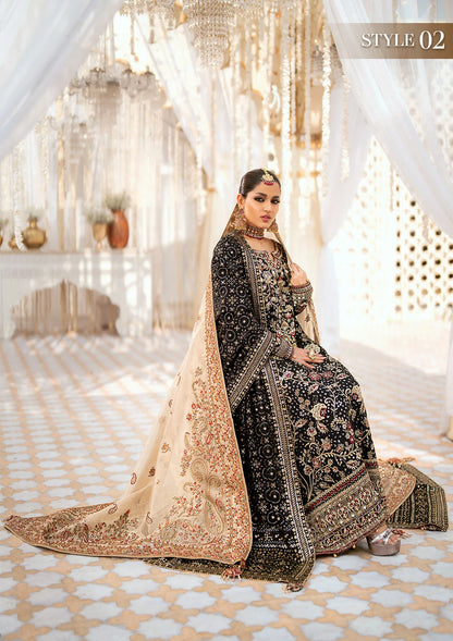 Luxurious medium silk ensemble with intricate embroidery, embellished borders, jamawaar pants, and an embroidered silk dupatta. Styled as a long shirt with gharara or izhaar pants for timeless elegance.