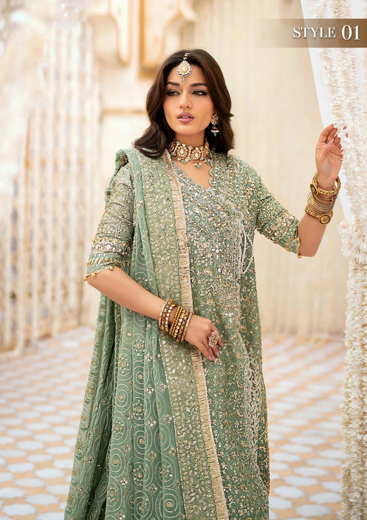 Elegant kundan zari ensemble with embellished organza neckline, detailed borders, masoori silk pants, and a chiffon dupatta. Styled as angrakha with gharara or long shirt with crushed frock.