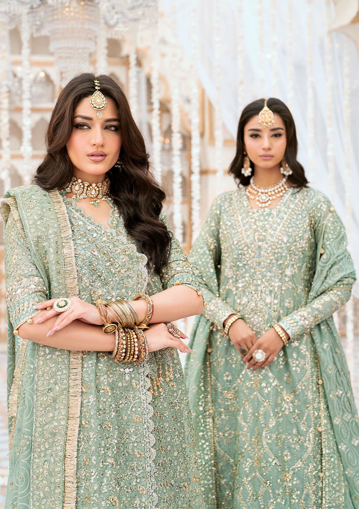 Elegant kundan zari ensemble with embellished organza neckline, detailed borders, masoori silk pants, and a chiffon dupatta. Styled as angrakha with gharara or long shirt with crushed frock.
