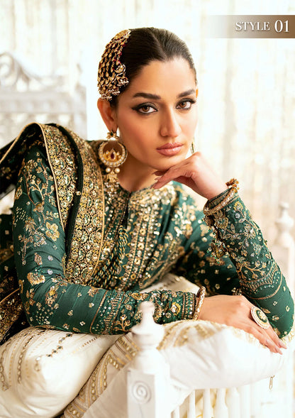 Elegant medium silk suit with rich embroidery, organza borders, jamawaar pants, and a chiffon dupatta. Styled with crushed sharara or classic gharara.