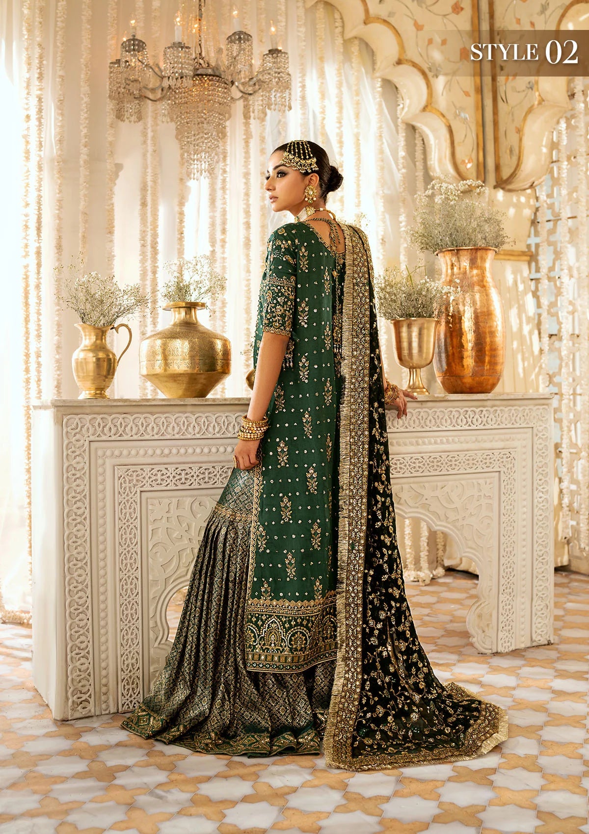 Elegant medium silk suit with rich embroidery, organza borders, jamawaar pants, and a chiffon dupatta. Styled with crushed sharara or classic gharara.