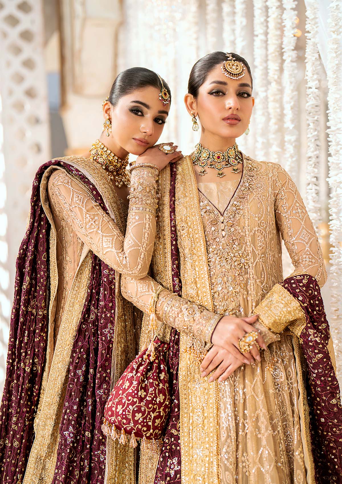 Graceful embroidered chiffon ensemble with embellished organza neckline, rich borders, jamawaar pants, and a medium silk dupatta. Styled as kalidaar frock with crushed frock or angrakha with crushed skirt.