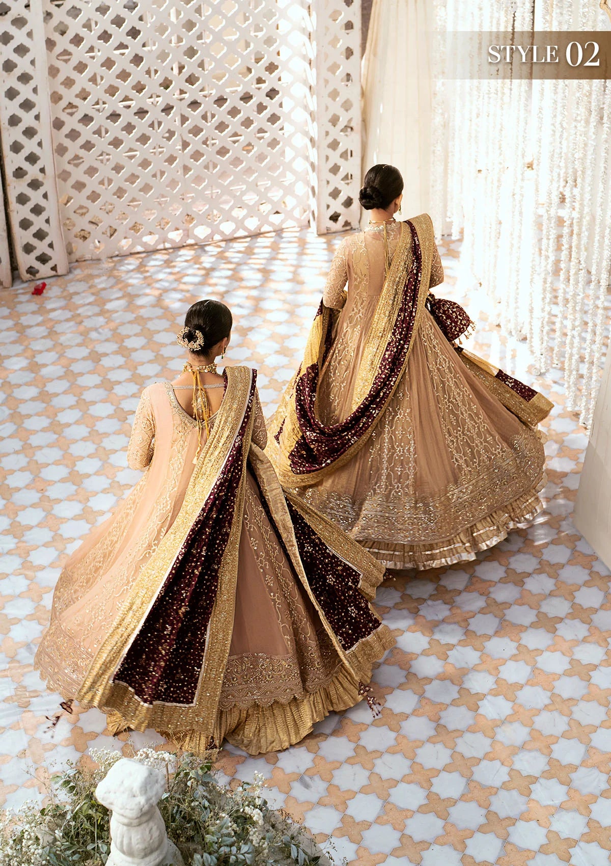 Graceful embroidered chiffon ensemble with embellished organza neckline, rich borders, jamawaar pants, and a medium silk dupatta. Styled as kalidaar frock with crushed frock or angrakha with crushed skirt.