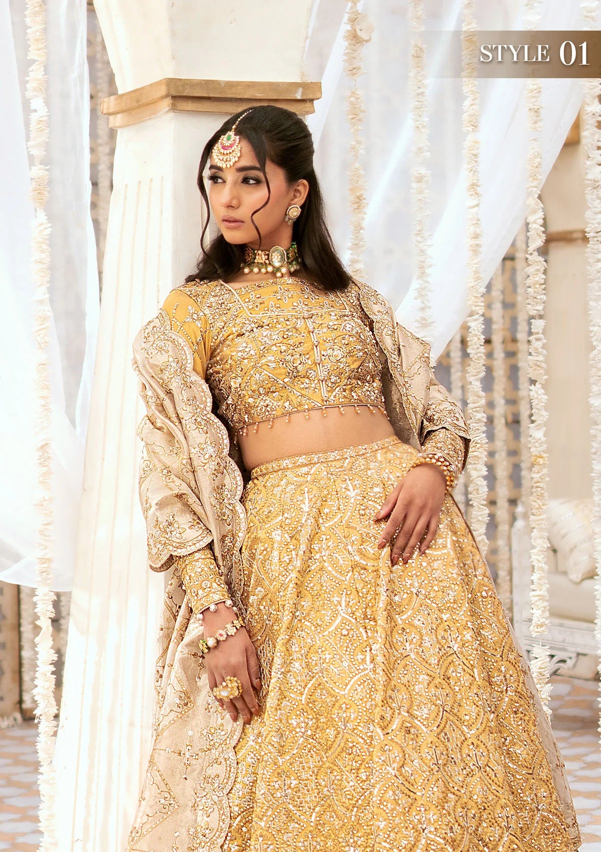 Luxurious tissue ensemble with embellished bodice, neck jaal, rich borders, jamawaar pants, and a contrast tissue dupatta. Styled as blouse with lehnga or kalidaar frock with crushed skirt.