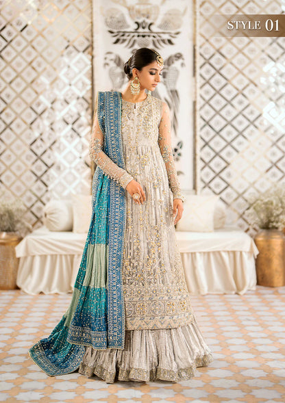 Elegant embroidered net suit featuring organza borders, jamawaar pants, and a medium silk dupatta with detailed embroidery for festive wear occasions!