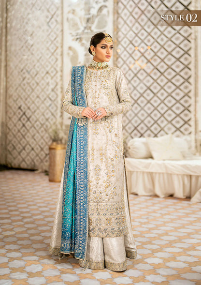 Elegant embroidered net suit featuring organza borders, jamawaar pants, and a medium silk dupatta with detailed embroidery for festive wear occasions!