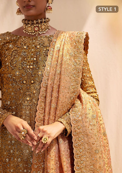 Opulent kundan zari ensemble with rich embroidery, tissue borders, masoori silk pants, and an embroidered tissue dupatta. Styled as a long shirt with crushed frock or farshi gharara for regal elegance.