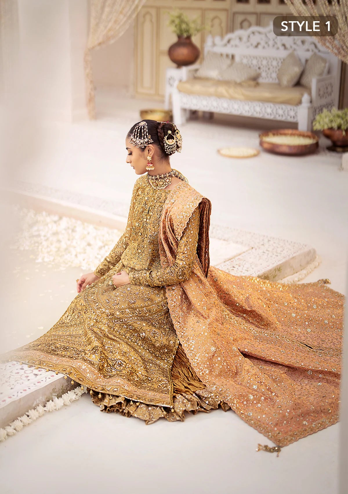 Opulent kundan zari ensemble with rich embroidery, tissue borders, masoori silk pants, and an embroidered tissue dupatta. Styled as a long shirt with crushed frock or farshi gharara for regal elegance.