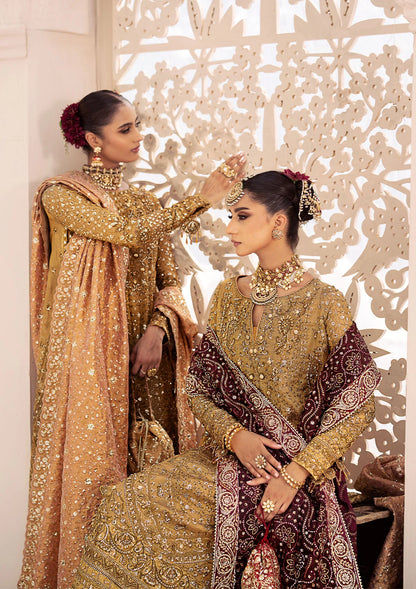 Opulent kundan zari ensemble with rich embroidery, tissue borders, masoori silk pants, and an embroidered tissue dupatta. Styled as a long shirt with crushed frock or farshi gharara for regal elegance.