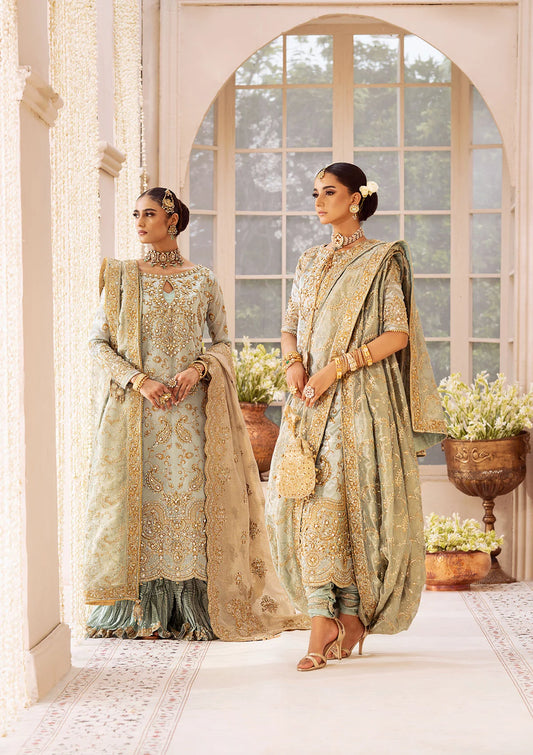 Graceful tissue ensemble with hand embellishments, hem patches, organza borders, masoori silk pants, and an embroidered tissue dupatta. Styled as a Hyderabadi shirt with churi pyjama or a long shirt with crushed sharara.