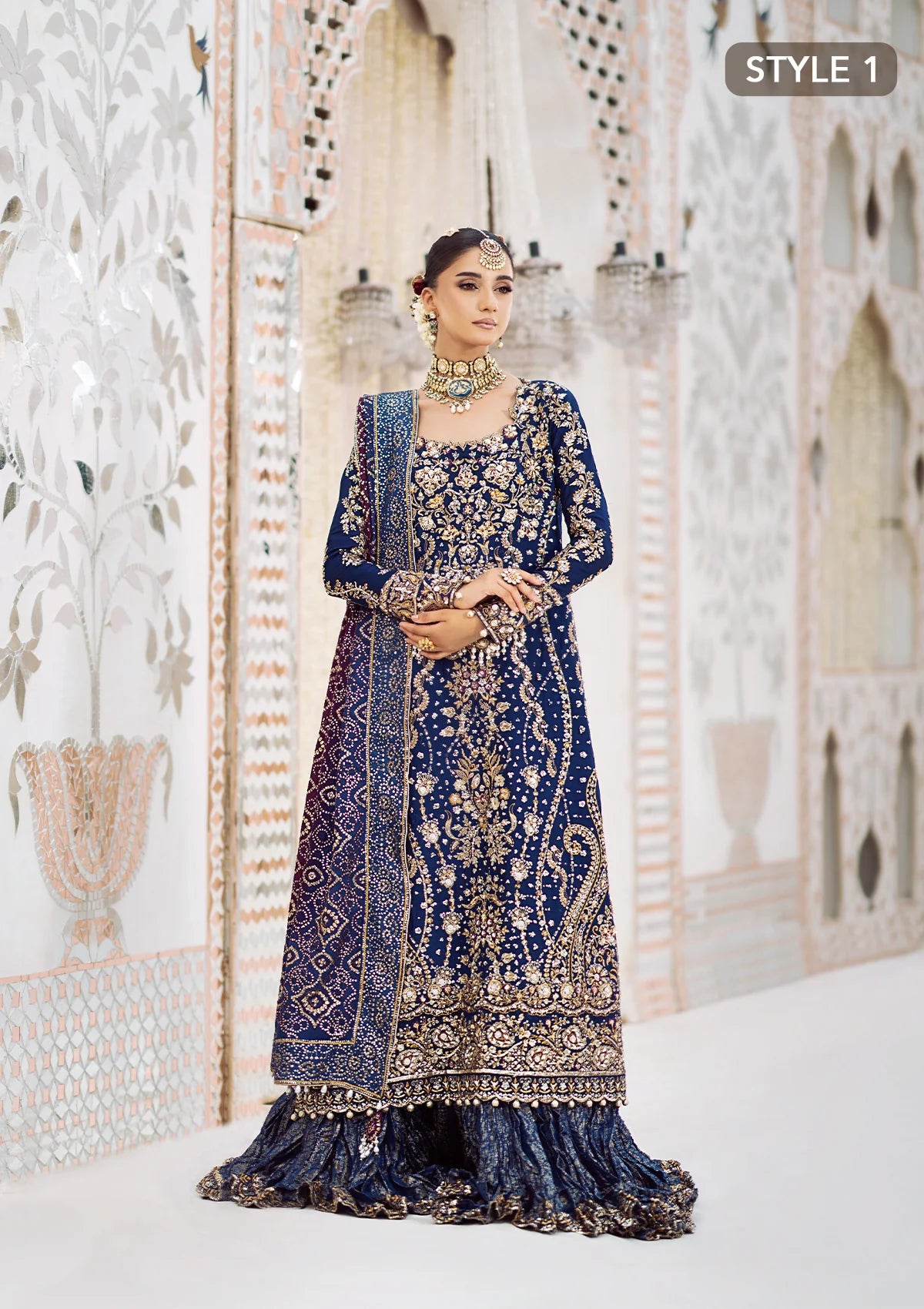 Luxurious medium silk outfit with rich embroidery, organza borders, jamawaar pants, and an embroidered silk dupatta. Styled as gharara or izhaar pants.